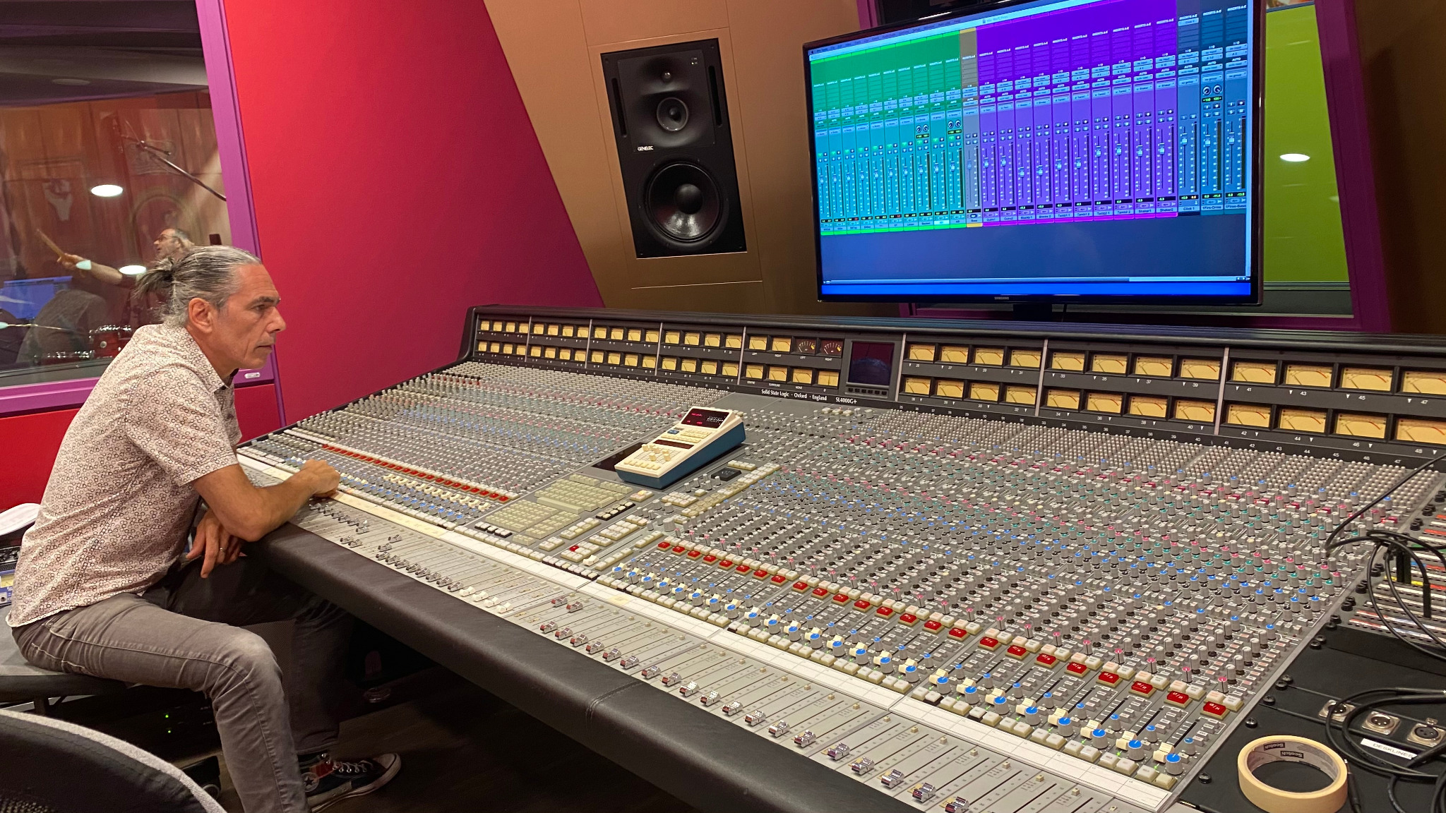 Yann Kuhlmann working at a professional studio console